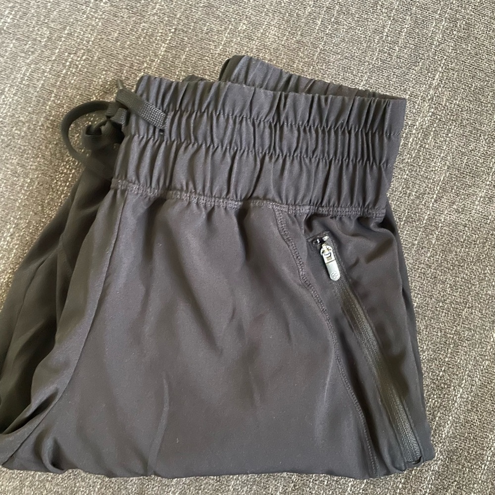 Black Zella joggers with zippers in the front & light weight.
